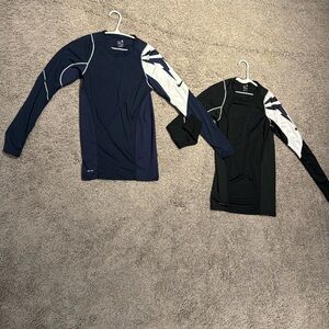 Nike Long Sleeve Size Medium.  Listing includes 2 shirts (Black and Navy)